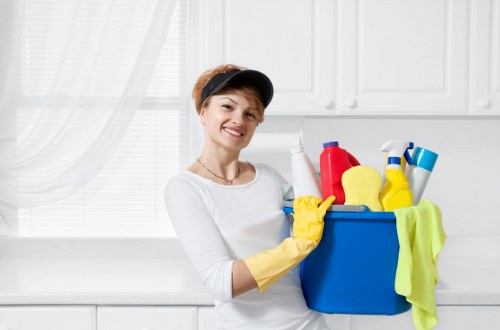 Professional carpet cleaners working in Enfield Wash during a deep cleaning service