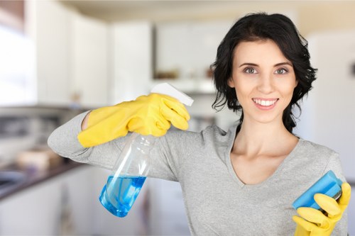 Cleaner treating stained office carpet during commercial carpet cleaning in Enfield Wash
